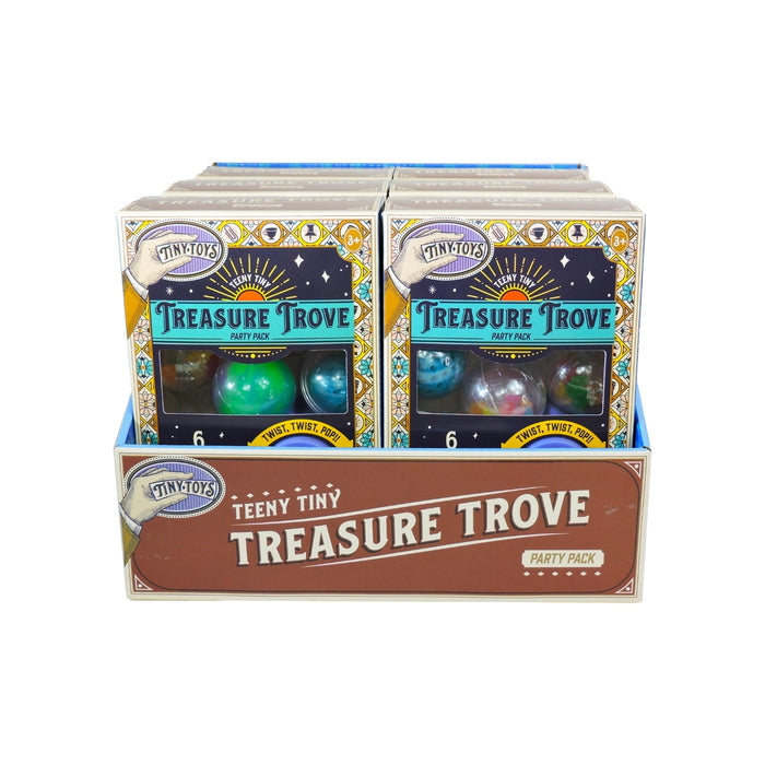 A display box of Tiny Toys Teeny Tiny Treasure Trove by Tiny Toys, featuring several packs with colorful packaging and small collectible capsules visible in each.