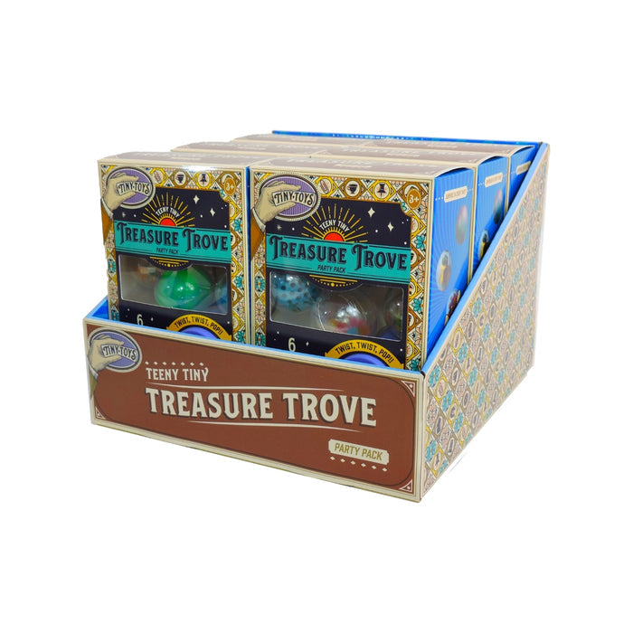 A display box of Tiny Toys Teeny Tiny Treasure Trove by Tiny Toys, featuring colorful designs and collectible surprise capsules visible through each package’s clear window.