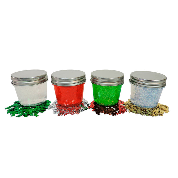 Toysmith Deluxe Holiday Mix-In Slime by Toysmith includes four small jars with silver lids, each filled with white, red, green, or blue glitter. Matching loose glitter is scattered underneath for festive sensory play.