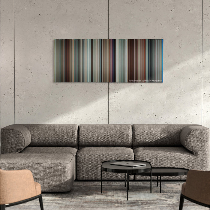 Up in the Air color palette canvas on a concrete wall above a gray sectional sofa