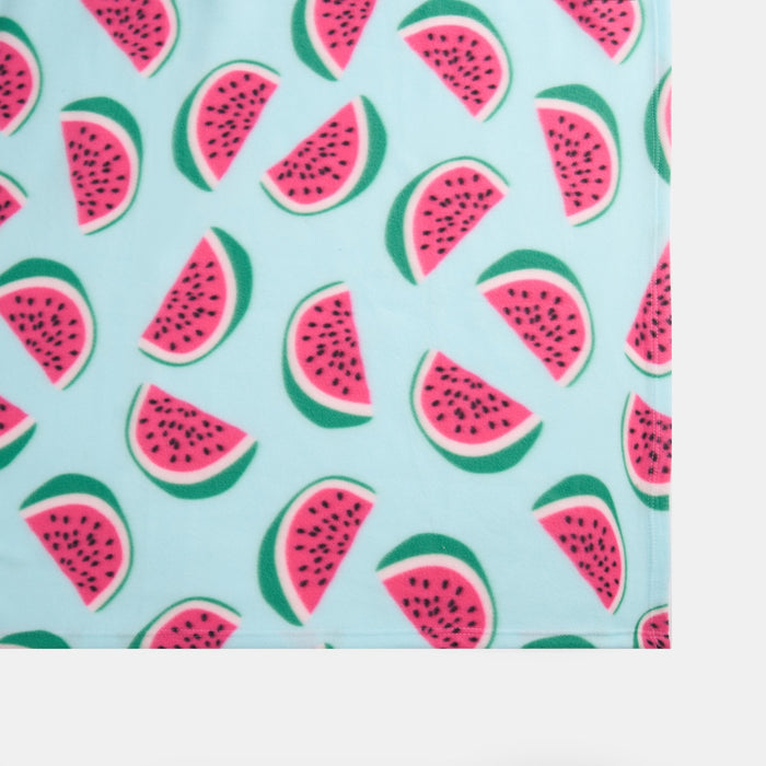 close-up view of watermelon fleece throw with focus on texture and print