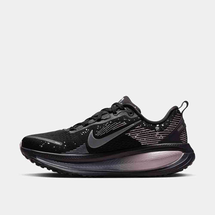 Side medial view of the Women's Nike Vomero 18 SE.