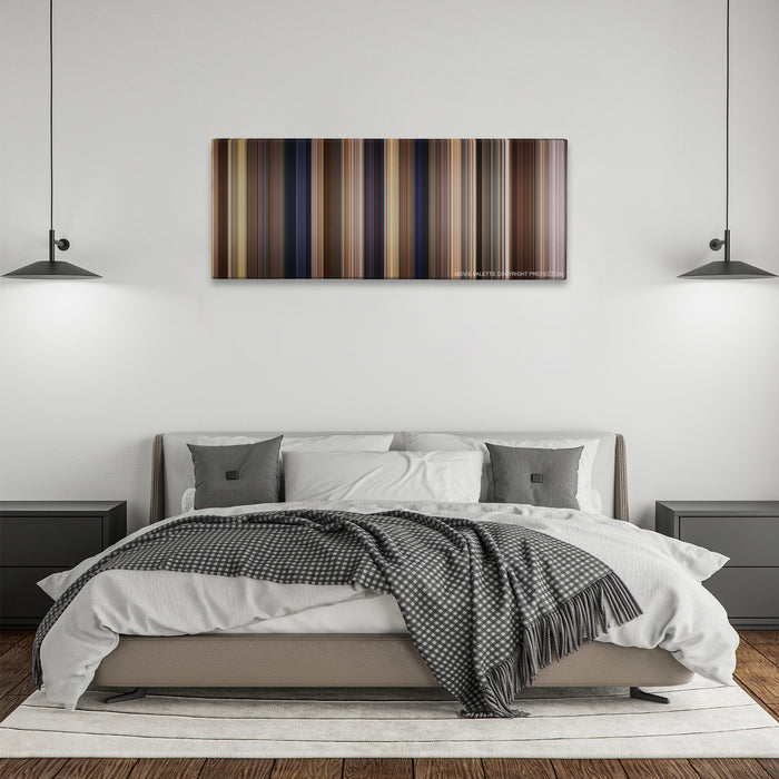 Yes Man color palette canvas above a bed, between two black pendant lamps